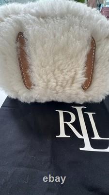 NWT Ralph Lauren Polo 100% Shearling With Leather Strap & Dust Bag. New $598 NWT Ralph Lauren Polo 100% Shearling With Leather Strap & Dust Bag. New $598